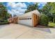 Brick house with attached garage and long driveway at 3029 River Rd, Shelby, NC 28152