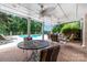 Covered patio with pool view, table, and chairs at 3029 River Rd, Shelby, NC 28152
