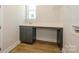 Laundry room with gray cabinets, a utility sink, and ample counter space at 1014 Lowland Way, Waxhaw, NC 28173