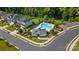 Community pool with surrounding lounge chairs and a clubhouse at 3105 Elmwood Dr, Monroe, NC 28110