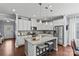 Modern kitchen featuring granite island, stainless steel appliances, and white cabinets at 3105 Elmwood Dr, Monroe, NC 28110