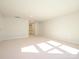 Spacious bonus room with carpet and natural light at 1204 Meander Ln, Waxhaw, NC 28173