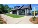 Community pool house with large garage doors at 1204 Meander Ln, Waxhaw, NC 28173