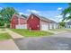 Red garage with white door and driveway at 1801 Edgewater Nw Dr, Conover, NC 28613