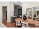 Built-in wet bar and dining area with wood table at 5403 Gorham Dr, Charlotte, NC 28226