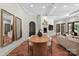 Elegant dining area with wood table and access to living room and outdoor patio at 5403 Gorham Dr, Charlotte, NC 28226