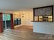 Kitchen with breakfast bar and decorative backsplash at 7201 Winery Ln, Charlotte, NC 28227