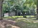 Fenced-in dog park with benches and waste disposal at 7201 Winery Ln, Charlotte, NC 28227
