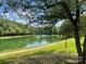 Serene pond with fountains and walking path at 7201 Winery Ln, Charlotte, NC 28227
