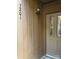 Front door entrance with stained-glass accents and light fixture at 7201 Winery Ln, Charlotte, NC 28227