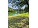 Peaceful pond with water fountain and green space at 7201 Winery Ln, Charlotte, NC 28227