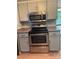 Kitchen boasts stainless steel microwave and range at 7201 Winery Ln, Charlotte, NC 28227