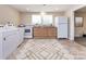 Clean kitchen featuring white appliances and wood cabinets at 1762 Old Carter St, Lancaster, SC 29720