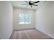 Bright bedroom with carpet flooring and a large window at 14941 Deer Hollow Dr, Gold Hill, NC 28071