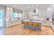 Modern kitchen with white cabinets, quartz countertops, and island at 14941 Deer Hollow Dr, Gold Hill, NC 28071