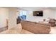 Spacious basement with a large TV, comfortable seating and a workspace at 14941 Deer Hollow Dr, Gold Hill, NC 28071