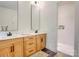 Modern bathroom featuring a double vanity and a walk-in shower at 14941 Deer Hollow Dr, Gold Hill, NC 28071