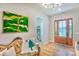 Inviting entryway with hardwood floors, unique art, and a charming couch at 14941 Deer Hollow Dr, Gold Hill, NC 28071