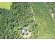 Single-Gathering home situated on a wooded lot with a long driveway at 14941 Deer Hollow Dr, Gold Hill, NC 28071