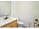 Clean bathroom with a single sink and toilet, a simple and elegant design at 14941 Deer Hollow Dr, Gold Hill, NC 28071