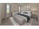 Bright bedroom with plush carpet and ample natural light at 1650 Village Grove Ln, Monroe, NC 28110