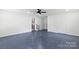 Clean, spacious basement with a gray epoxy floor and plenty of natural light at 2009 Echo Ln, Gastonia, NC 28052