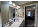 Clean bathroom with vanity, mirror and shower access at 331 Polk Ford Rd, Stanfield, NC 28163