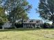 Two-story home on a grassy hill, with attached garage at 331 Polk Ford Rd, Stanfield, NC 28163