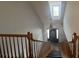 View from upstairs landing to entryway with skylight at 331 Polk Ford Rd, Stanfield, NC 28163