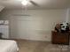 Bedroom with double doors and dresser at 331 Polk Ford Rd, Stanfield, NC 28163