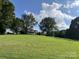 Two story home on a large lot with lush green lawn at 331 Polk Ford Rd, Stanfield, NC 28163