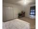 Bedroom with a double door closet and plush toys at 331 Polk Ford Rd, Stanfield, NC 28163