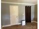 Bedroom with dehumidifier and dark curtains at 331 Polk Ford Rd, Stanfield, NC 28163