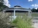 White gazebo with a white picket fence at 331 Polk Ford Rd, Stanfield, NC 28163