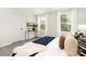 Bright bedroom with large windows, plush carpet, and modern decor at 294 Washington St, York, SC 29745