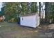 Small wooden storage shed in backyard at 6800 Terry Ln, Charlotte, NC 28215