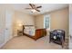 Cozy bedroom with a ceiling fan and neutral decor at 4055 Dakeita Cir, Concord, NC 28025