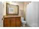 Clean bathroom featuring granite countertop and a shower/tub combo at 4055 Dakeita Cir, Concord, NC 28025