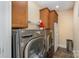 Laundry room with LG washer and dryer, and built-in cabinets at 4055 Dakeita Cir, Concord, NC 28025