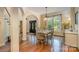 Elegant dining room with hardwood floors and a charming table setting at 4055 Dakeita Cir, Concord, NC 28025