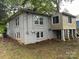 Ranch house with brick exterior, carport, and mature landscaping at 2102 Twin Ave, Gastonia, NC 28052