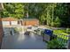 Relaxing deck overlooking the backyard, featuring a grill and outdoor furniture at 355 Davies Cir, Cleveland, NC 27013