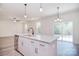 Kitchen island with granite top, sink, and dishwasher at 144 Fleming Dr, Statesville, NC 28677