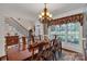 Formal dining room with large windows and hardwood floors at 312 Wintergreen Ct, Kings Mountain, NC 28086