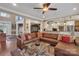 Open living room with a sectional sofa and views into kitchen at 312 Wintergreen Ct, Kings Mountain, NC 28086