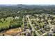 Aerial view showing a neighborhood with houses, streets, and green areas at 312 Wintergreen Ct, Kings Mountain, NC 28086