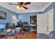 Home office with built-in shelving and hardwood floors at 312 Wintergreen Ct, Kings Mountain, NC 28086