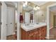 Double vanity bathroom with updated fixtures and a large mirror at 312 Wintergreen Ct, Kings Mountain, NC 28086