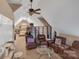 Spacious bonus room with leather seating and a glass-top coffee table at 312 Wintergreen Ct, Kings Mountain, NC 28086