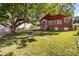 Large backyard with mature tree and grassy area at 600 Chapel S St, Landis, NC 28088